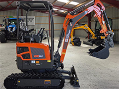 Side view of the orange CORE MACHINERY CM20C